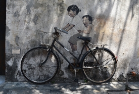 Art work of child on bicycle Penang