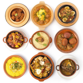 Assortment of Moroccan tagines and couscous viewed from above