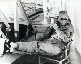 Astronaut John Glenn Relaxing on Deck