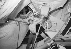 astronaut russell schweickart in orbital workshop simulator