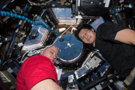 astronauts scott tingle and norishige kanai watch dragon cargo c