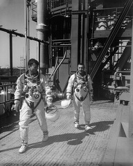 Astronauts shown leaving the launch pad