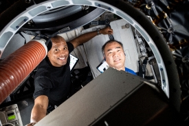 astronauts victor glover and soichi noguchi load the spacex carg