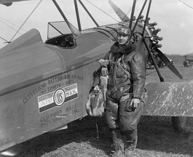Aviator standing with plane Cleveland Pittsburgh Air Mail