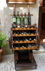 bottles of vine outside restaurant Sicily