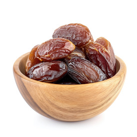 bowl of Dried dates fruits in wooden bowl