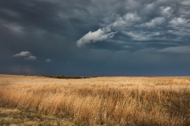 brewing storm above the grassland in Riley County Kansas