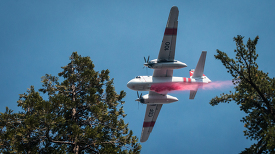 Cedar Fire aircrafts drops aerial retardant and water