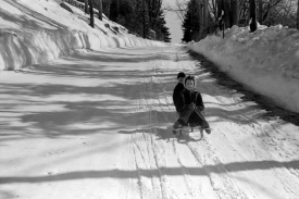Children ride on sleds almost all winter 1939 