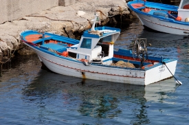 colorful blue and white fishing boat