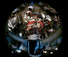 Fisheye view of astronauts McDivitt and White II inside the Gemi