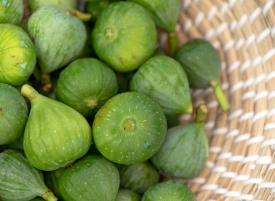 Fresh Green Figs In In A Wicker Basket 