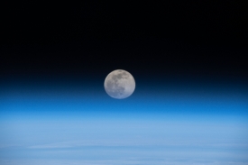 full moon above the earths horizon 11