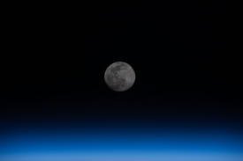 full moon above the earths horizon 22
