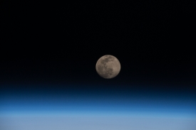 full moon above the earths horizon 33