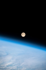 full moon above the earths horizon