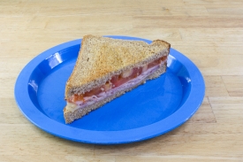 Grilled Ham Cheese and Tomato Sandwich half
