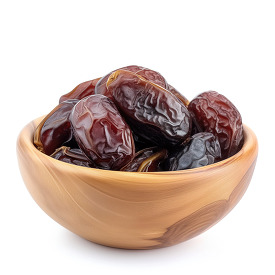 group of Dried dates fruits in small wood bowl