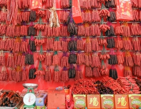hanging dried meat for sale in stall china town singapore