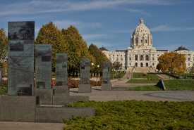 he Minnesota World War II Veterans memorial stands in the foregr