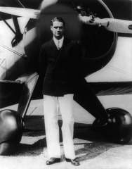 howard hughes standing in front of his new boeing portrait photo