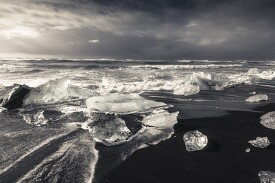 ice along the beach in iceland black white photo