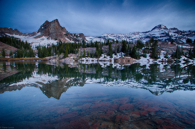 late spring reflection of Lake Blanche and the mountains