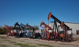 line of pumpjacks for sale in St John a small town in south cent