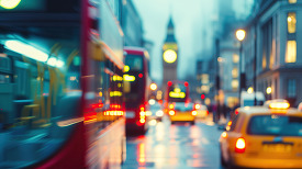 London city street with bokeh lights leading towards a blurred c