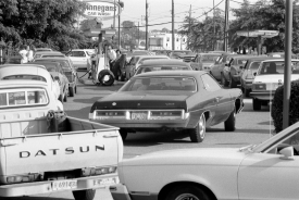 long lines of cars at a gas station waiting for fuel 1979