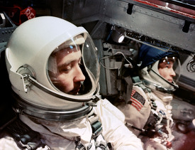 lose up view of astronauts James A. McDivitt (foreground) and Ed
