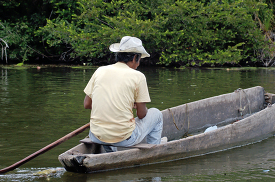 Man fishing on river in Belize