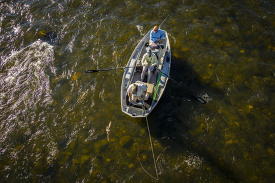 Men fish the Madison River in the Beaverhead Deerlodge National 