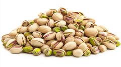 mound of pistachios with cracked shells