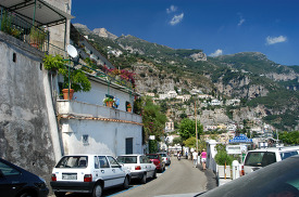 narrow road with houses amalfi coast