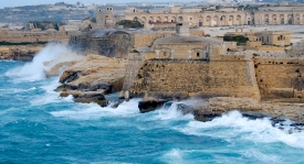 rough sea around the outside of the city walls of Valletta malta