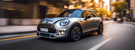 silver 2019 Mini ONE with black rims in the city