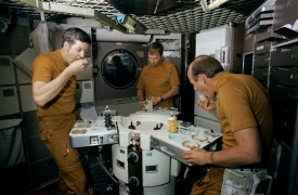 skylab crew members dine on specially prepared space food