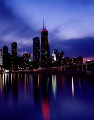 Skyline at dusk dominated by Willis Tower long known as Sears To