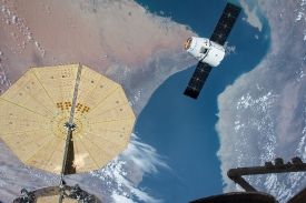 spacex dragon cargo craft arrives at iss