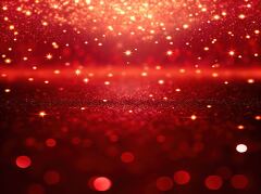 A mesmerizing display of red glitter sparkles fills the space, transforming it into a dreamlike environment. The shimmering effect captivates the eye, exuding warmth and festivity.