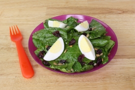 Spinach Salad with Raspberry Vinaigrette Dressing with eggs
