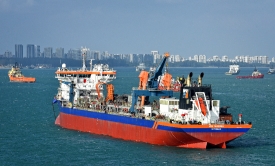 Sucking hopper dredging Ship in Singapore harbor