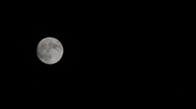 the full moon above the sea of okhotsk