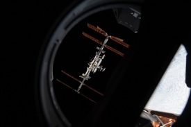 The International Space Station is pictured from inside a window