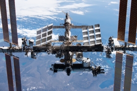 the space station is pictured from the spacex crew dragon 13