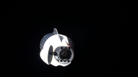 the spacex cargo dragon cargo craft approaches the space station