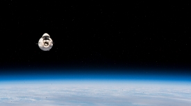 the spacex cargo dragon cargo craft approaches the station