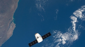 the spacex dragon cargo craft above the coast of mozambique