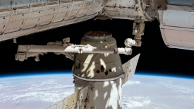 the spacex dragon cargo craft cargo craft is slowly removed from
